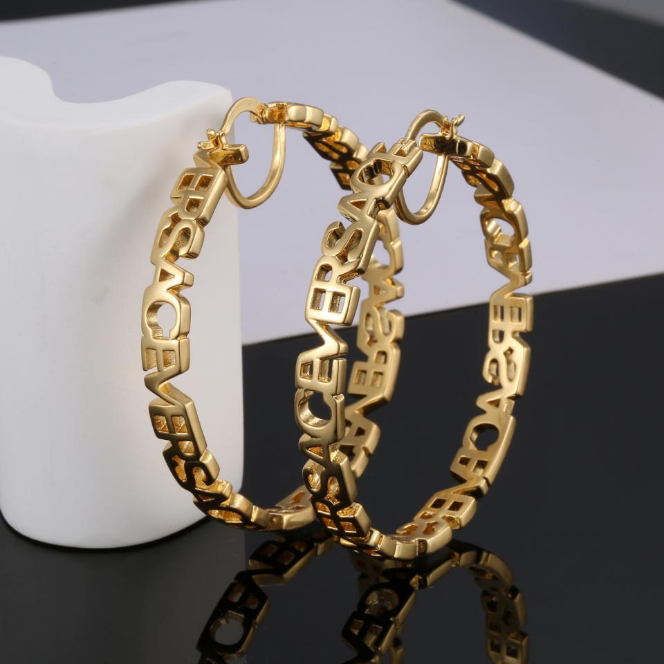 replica,repliche,fake,1:1,earrings,bracelet,ring,jewelry Orecchini in rilievo del volto di Versace