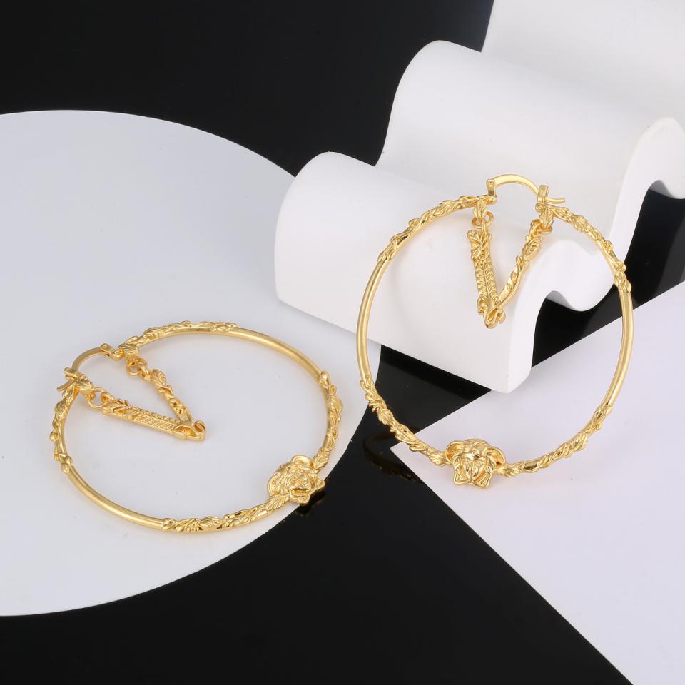 replica,repliche,fake,1:1,earrings,bracelet,ring,jewelry Orecchini in rilievo del volto di Versace
