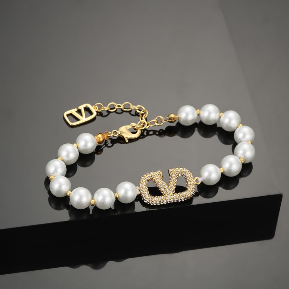 replica,repliche,fake,1:1,earrings,bracelet,ring,jewelry Bracciale di perle Valentino