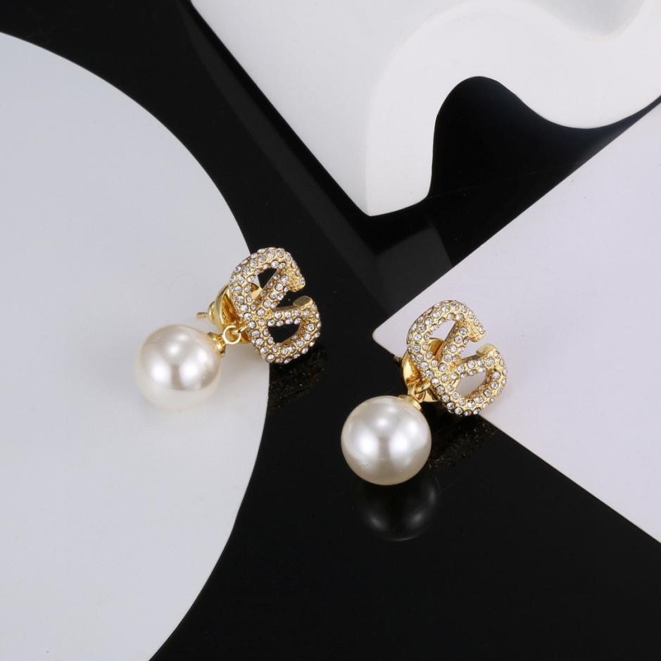 replica,repliche,fake,1:1,earrings,bracelet,ring,jewelry Orecchini a V con logo Valentino