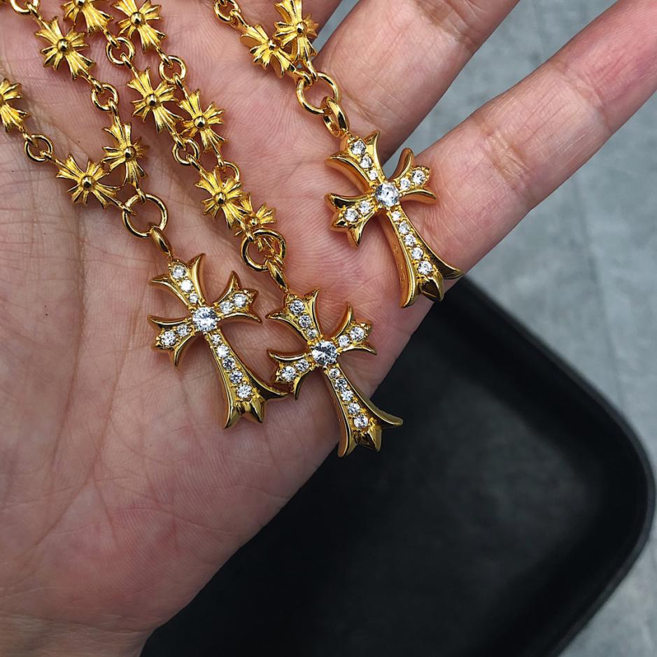 replica,repliche,fake,1:1,earrings,bracelet,ring,jewelry Collana con croce Sydney con cuori cromati